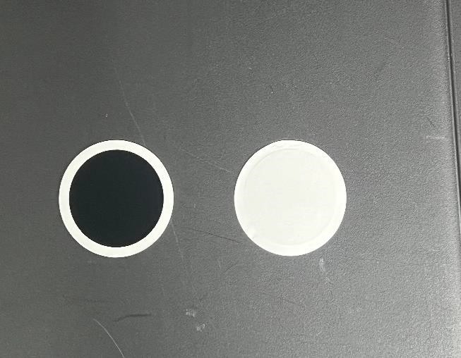 Test papers of exhaust smoke without the exhaust smoke (left) and with the exhaust smoke (right)